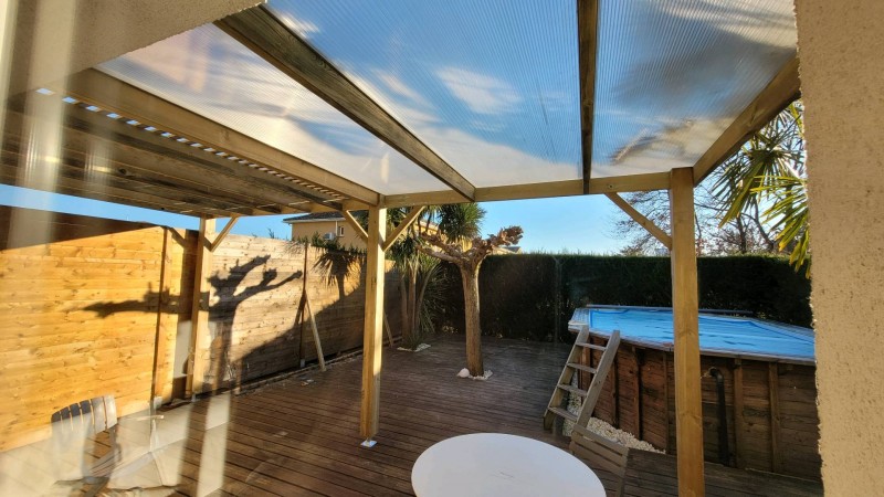 Pose d'une pergola bois autoclave a Arés